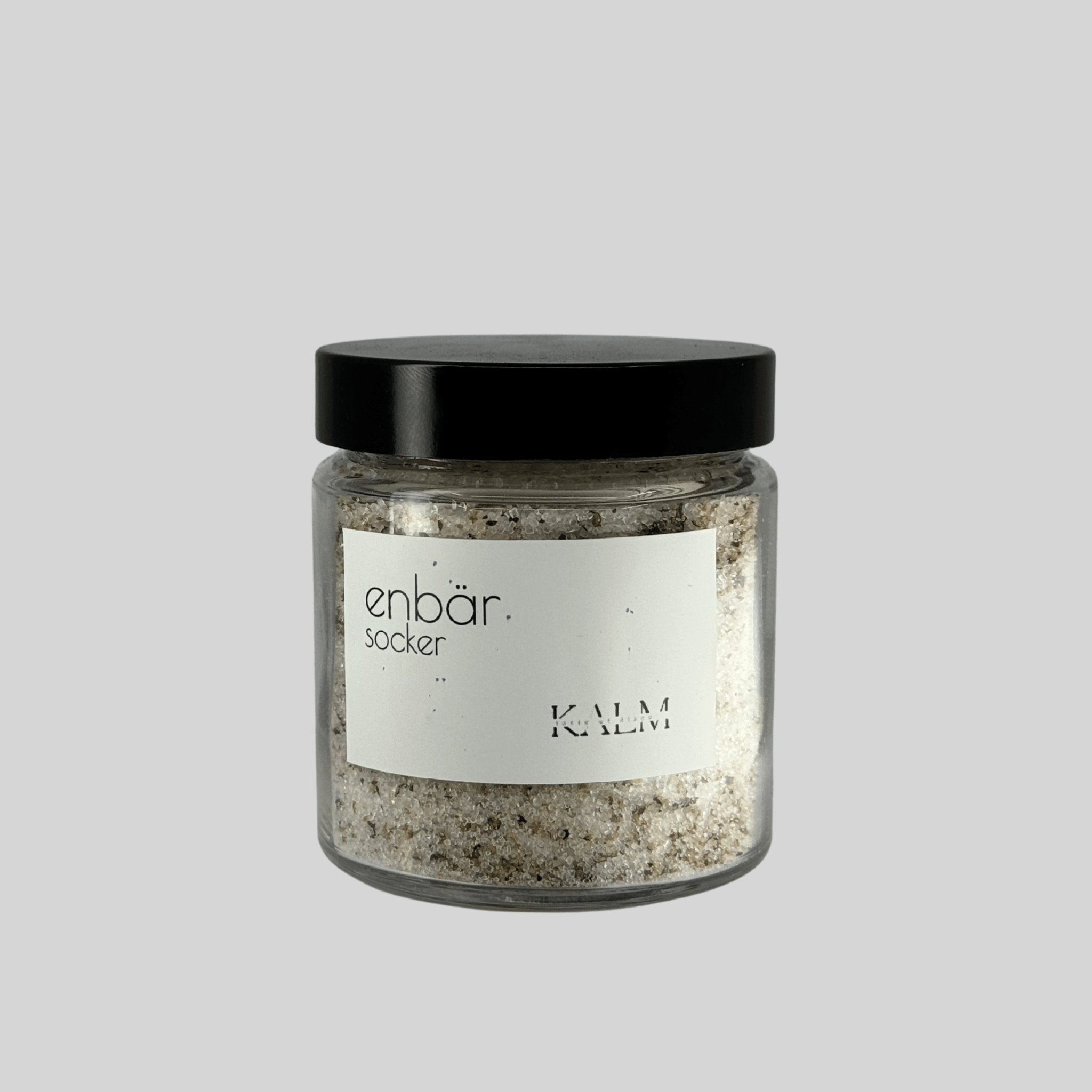 burk med Enbärssocker från Kalm Taste – handgjort smaksatt socker med mortlade enbär, perfekt till kakor, glass, chokladtryfflar och cocktails.