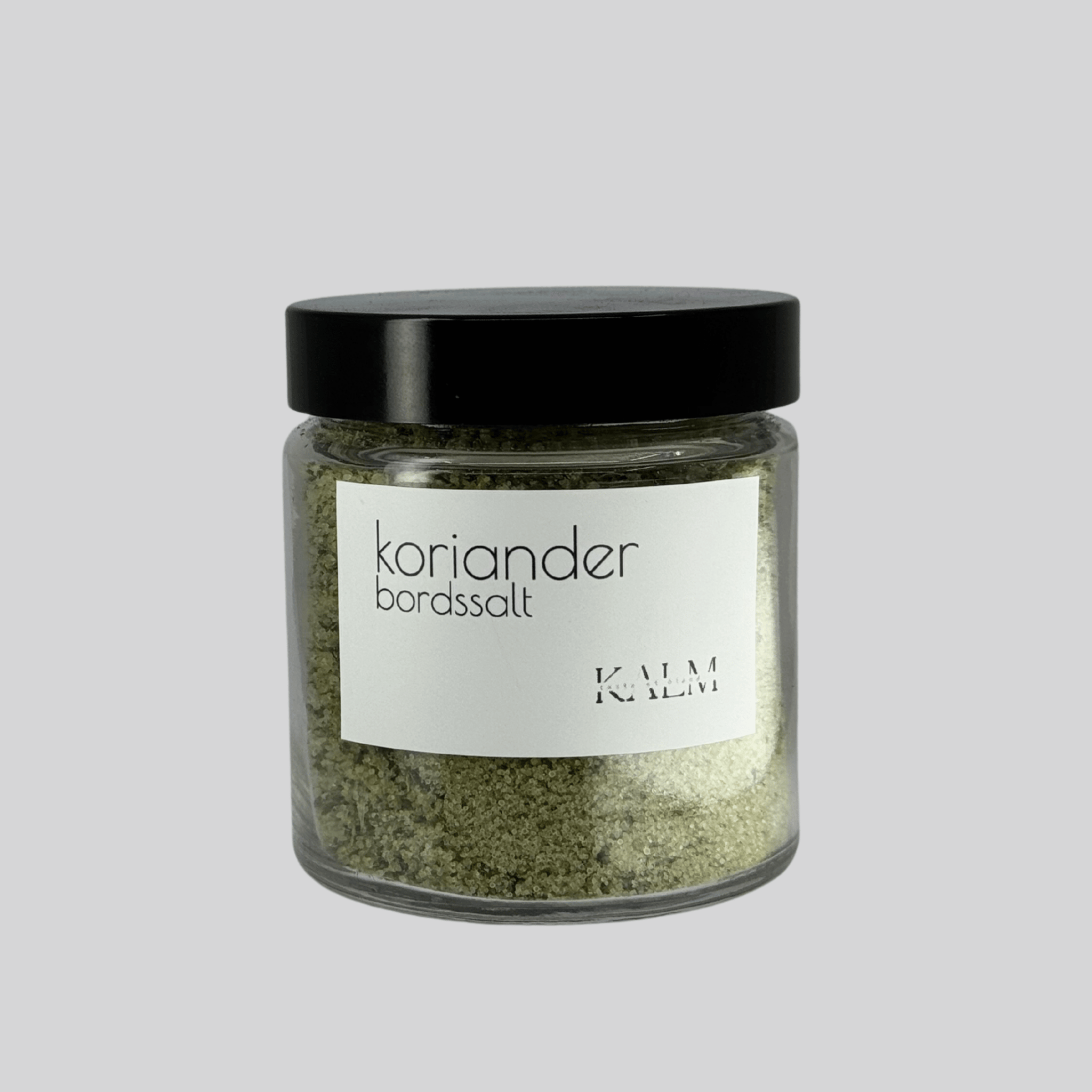 Burk med Koriander bordssalt från Kalm Taste – handgjort örtsalt med Ölandsodlad koriander och havssalt, perfekt till tacos, curry och sallader.