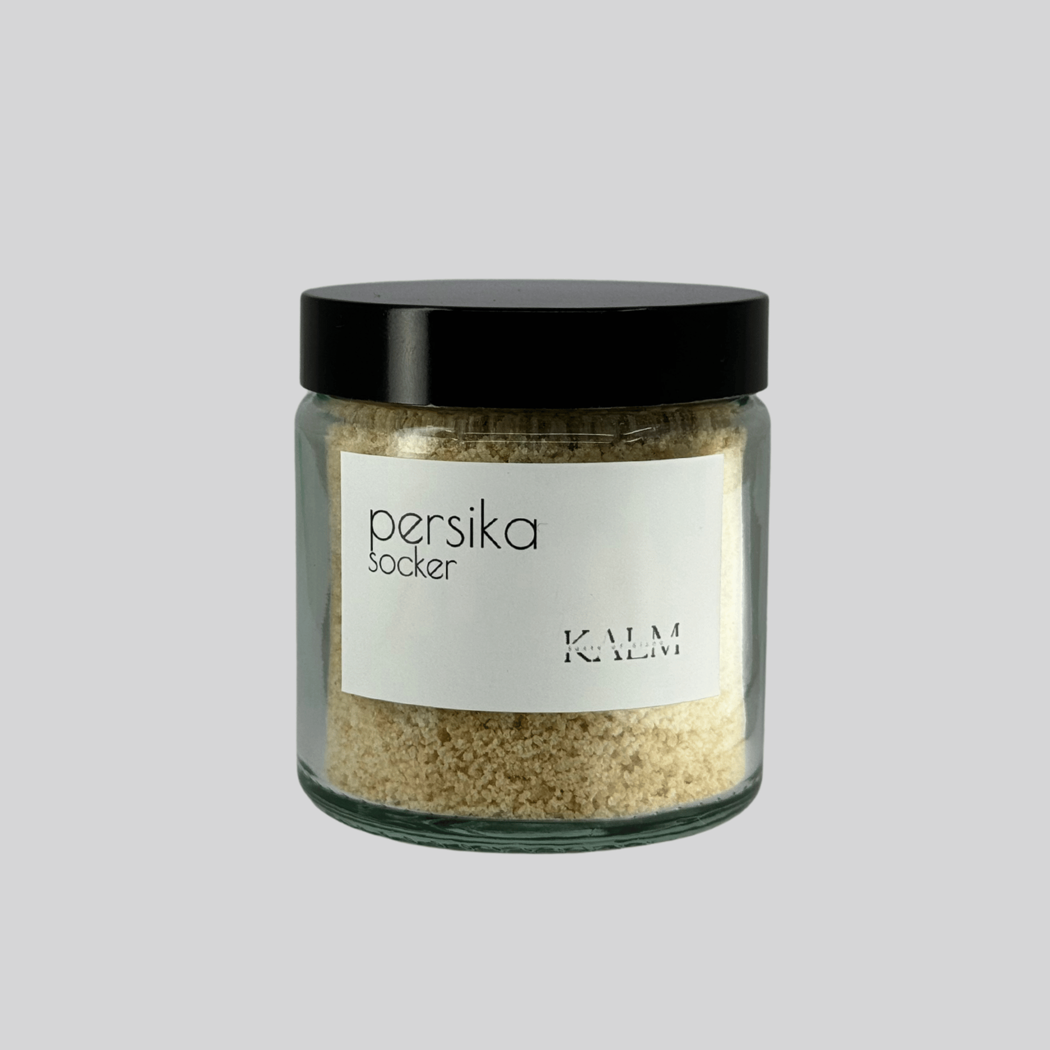 burk med Persikasocker från Kalm Taste – handgjort smaksatt socker med torkad persika, perfekt till bakverk, yoghurt, milkshakes och cocktails.