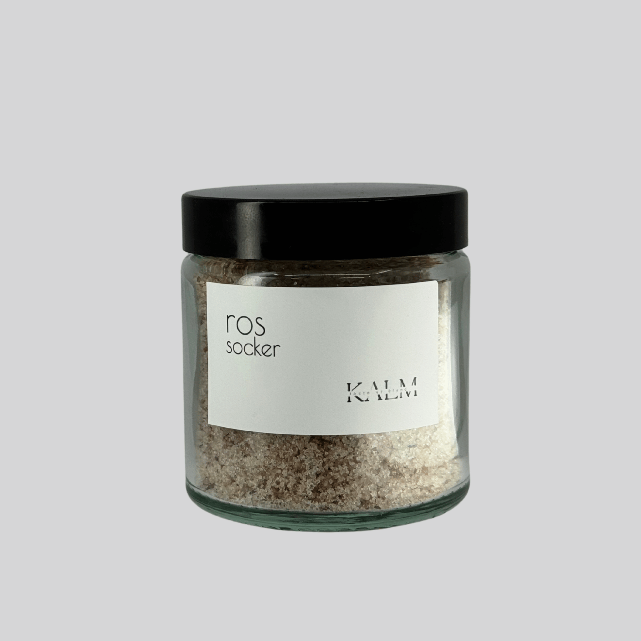 Burk med Rossocker från Kalm Taste – handgjort smaksatt socker med kronblad av damascenarosor från Öland, perfekt till bakverk, te och desserter.”