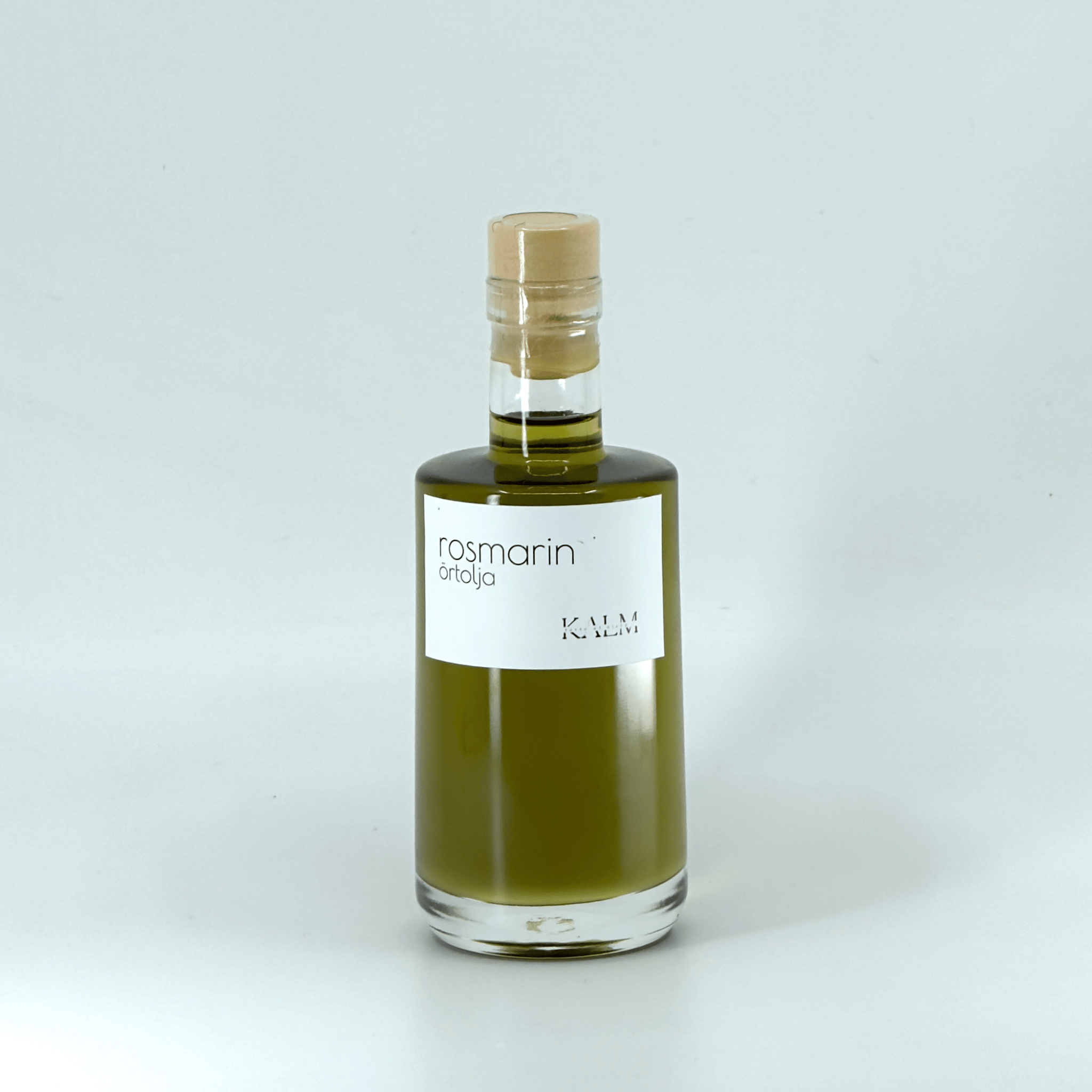 Rosmarinolja från Kalm Taste – kallpressad rapsolja infuserad med färsk, gårdsodlad rosmarin från Öland