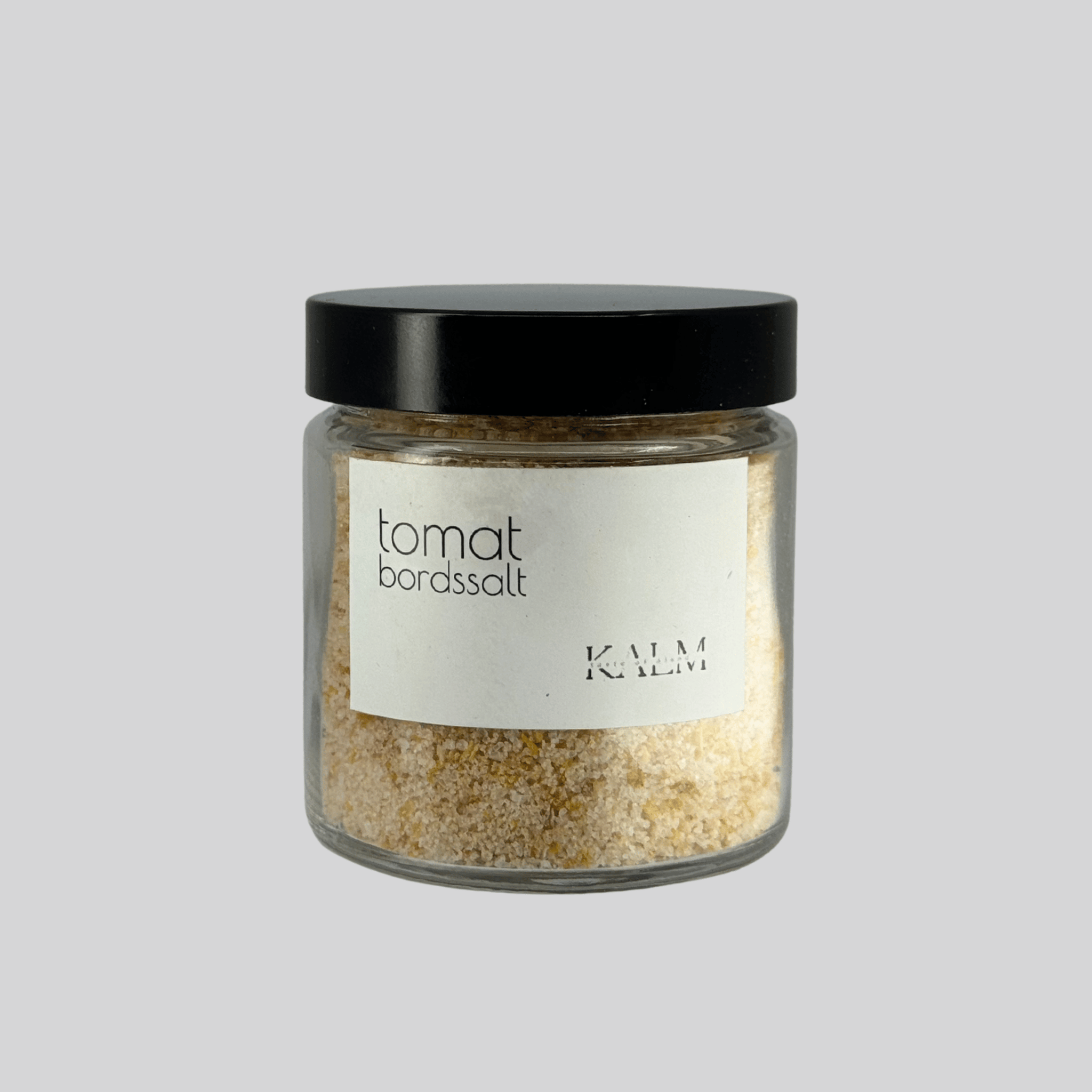 burk med Tomat bordssalt från Kalm Taste – handgjort örtsalt med Ölandsodlade tomater och havssalt, perfekt till pasta, pizza och sallader